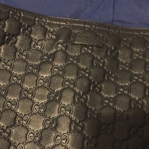 Gucci black leather guccissima messenger bag